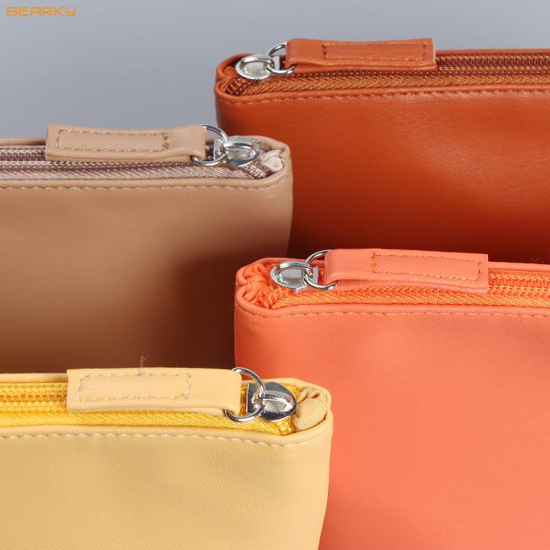 compact-orange-cosmetic-bag (1)